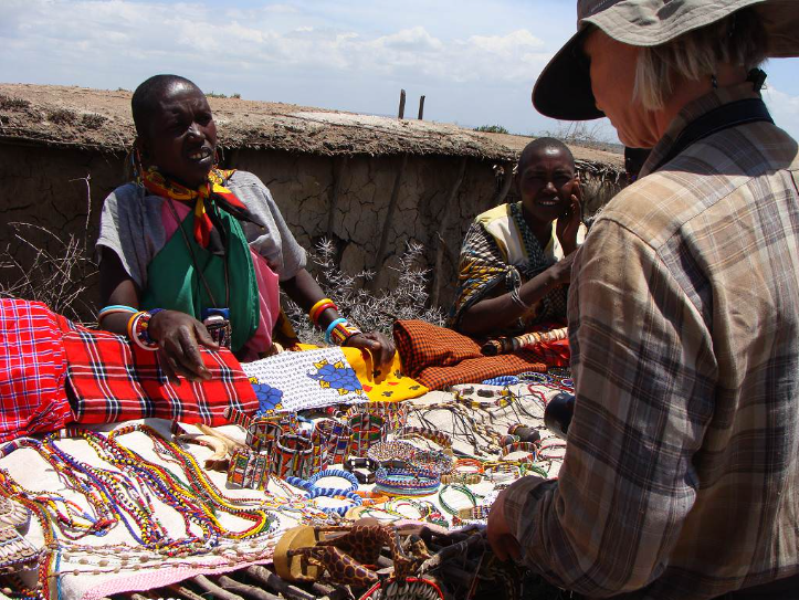 white_woman_visiting_a_maasai_village
